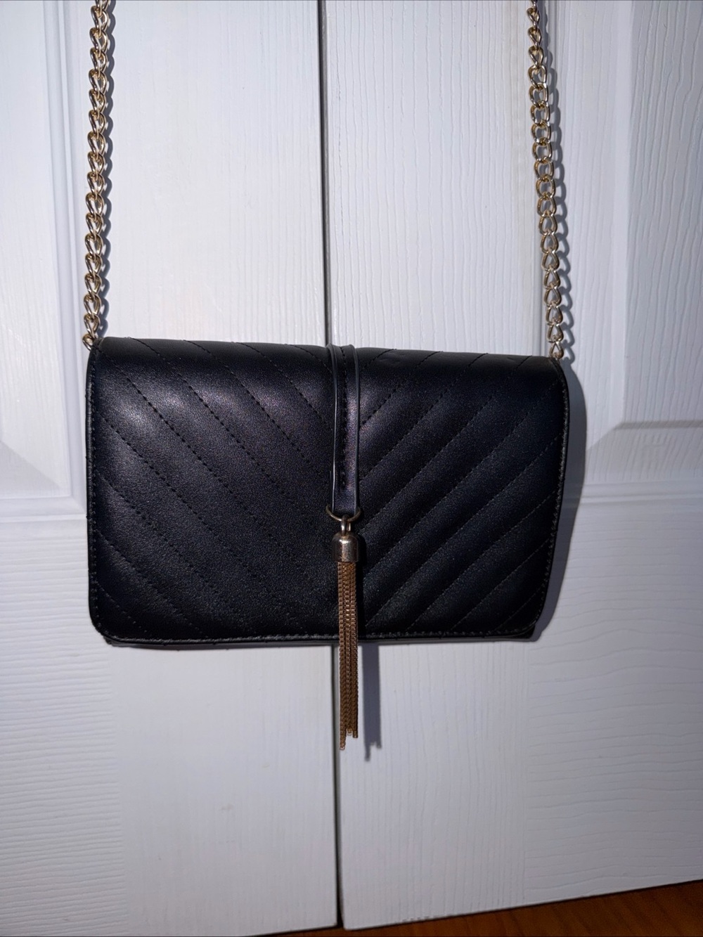 Olivia Miller Black Quilted Crossbody with Gold Chain and Tassel